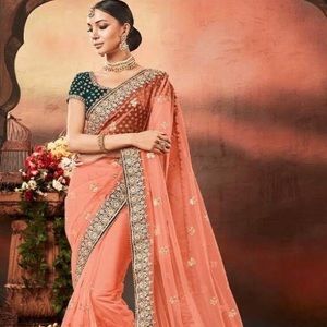 Lashkaraa peach and teal saree
